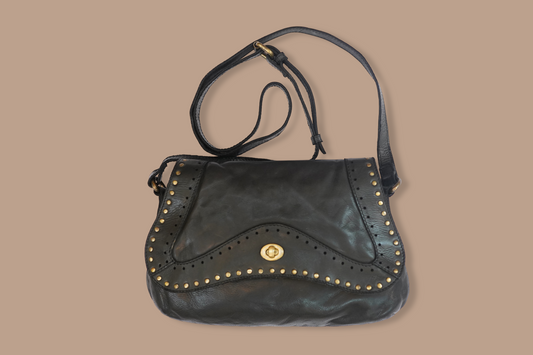 The Secret Behind Every Woman’s Obsession with Leather Handbags